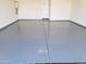 Garage with epoxy coated flooring at 20542 N 226Th Ln, Surprise, AZ 85387