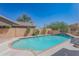 Inviting kidney-shaped pool in a desert landscape at 753 E Mountain Sky Ave, Phoenix, AZ 85048