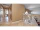Bright hallway with tile flooring and access to bedrooms at 753 E Mountain Sky Ave, Phoenix, AZ 85048