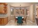 Bright breakfast nook overlooking the backyard oasis at 753 E Mountain Sky Ave, Phoenix, AZ 85048