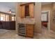 Convenient wet bar with wine rack and beverage cooler at 753 E Mountain Sky Ave, Phoenix, AZ 85048
