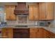 Kitchen with granite countertops and wood cabinets at 753 E Mountain Sky Ave, Phoenix, AZ 85048