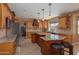 Open concept kitchen with large island, granite countertops, and breakfast bar at 753 E Mountain Sky Ave, Phoenix, AZ 85048