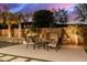 Cozy outdoor fireplace and seating area, perfect for relaxing evenings at 5088 S Ponderosa Dr, Gilbert, AZ 85298