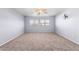 Spacious bedroom with carpet flooring and neutral walls at 10520 W Patrick Ln, Peoria, AZ 85383