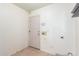 Laundry room with tiled floor and exterior access at 10520 W Patrick Ln, Peoria, AZ 85383