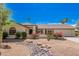 Charming single story home with desert landscaping at 12407 W Foxfire Dr, Sun City West, AZ 85375