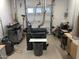 Well-equipped workshop featuring various woodworking tools and ample workspace at 2661 N Higley Rd, Mesa, AZ 85215