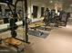 Community gym with weight machines and benches at 2661 N Higley Rd, Mesa, AZ 85215