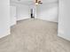 Bright and airy bedroom with neutral carpeting and ceiling fan at 2199 E Gillcrest Rd, Gilbert, AZ 85298