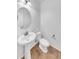 Neat bathroom with pedestal sink and tile floor at 2199 E Gillcrest Rd, Gilbert, AZ 85298
