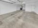 Two-car garage with automatic door and concrete floor at 2199 E Gillcrest Rd, Gilbert, AZ 85298