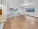 Open dining room and kitchen area with tile flooring and a view to the backyard at 2199 E Gillcrest Rd, Gilbert, AZ 85298