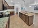 Spacious kitchen with granite countertops, island, and stainless steel appliances at 2199 E Gillcrest Rd, Gilbert, AZ 85298