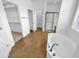 Spa-like bathroom featuring a large soaking tub, walk-in shower, and ample closet space at 2199 E Gillcrest Rd, Gilbert, AZ 85298