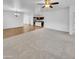 Open living room with neutral carpet and view of the kitchen at 2199 E Gillcrest Rd, Gilbert, AZ 85298