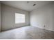 Bedroom with tile floors and window blinds at 4143 E Rockledge Rd, Phoenix, AZ 85044