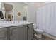 Clean bathroom with single vanity and shower/tub combo at 11818 W Luxton Ln, Avondale, AZ 85323