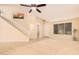 Spacious living room with high ceilings, neutral color palette, and carpeted floors at 2301 E Azalea Dr, Chandler, AZ 85286