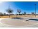 Outdoor basketball court with single hoop and markings at 2301 E Azalea Dr, Chandler, AZ 85286