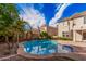 Stunning pool with a brick patio and palm trees at 2301 E Azalea Dr, Chandler, AZ 85286