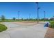 Sand volleyball court with surrounding concrete walkway at 2301 E Azalea Dr, Chandler, AZ 85286