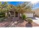 Beautiful two-story home with stone facade and landscaped yard at 2301 E Azalea Dr, Chandler, AZ 85286