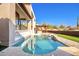 Relaxing pool and spa with a pergola and outdoor kitchen area at 8170 E Golden Spur Ln, Carefree, AZ 85377