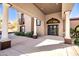Elegant entryway with columns and a wrought-iron door at 8170 E Golden Spur Ln, Carefree, AZ 85377