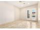 Spacious bedroom with tile floors and access to patio at 8170 E Golden Spur Ln, Carefree, AZ 85377