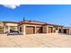 Three-car garage with additional covered parking at 8170 E Golden Spur Ln, Carefree, AZ 85377