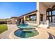 Stunning pool and spa with a unique design and plenty of space for relaxation at 8170 E Golden Spur Ln, Carefree, AZ 85377