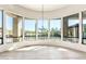 Sunlit dining room with large windows offering scenic views at 8170 E Golden Spur Ln, Carefree, AZ 85377
