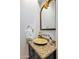 Stylish powder room with a unique vessel sink and granite countertop at 36975 N Mirabel Club Dr, Scottsdale, AZ 85262