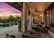 Covered patio overlooking the pool and desert landscape at 36975 N Mirabel Club Dr, Scottsdale, AZ 85262