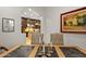 Dining room with view into kitchen and elegant decor at 36975 N Mirabel Club Dr, Scottsdale, AZ 85262
