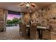 Outdoor patio with seating area and views of the pool at 36975 N Mirabel Club Dr, Scottsdale, AZ 85262