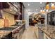 Gourmet kitchen with granite countertops, stainless steel appliances, and custom cabinetry at 36975 N Mirabel Club Dr, Scottsdale, AZ 85262
