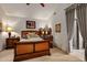 Spacious bedroom with a comfortable bed and ensuite bathroom at 36975 N Mirabel Club Dr, Scottsdale, AZ 85262