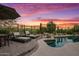 Inviting pool area with lounge chairs and sunset views at 36975 N Mirabel Club Dr, Scottsdale, AZ 85262