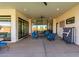 Covered patio with seating area and access to the interior at 23008 E Galveston St, Mesa, AZ 85212