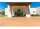 Modern home with covered entryway and glass doors at 23008 E Galveston St, Mesa, AZ 85212