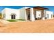 Modern house with a covered entryway and artificial turf at 23008 E Galveston St, Mesa, AZ 85212