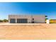 Modern home exterior with two-car garage and desert landscaping at 23008 E Galveston St, Mesa, AZ 85212