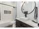 Modern bathroom with a sleek vanity and walk-in shower at 23008 E Galveston St, Mesa, AZ 85212