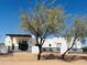 Front view of modern home with desert landscaping at 23008 E Galveston St, Mesa, AZ 85212