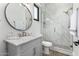 Elegant bathroom with marble finishes and a glass shower at 23008 E Galveston St, Mesa, AZ 85212