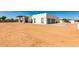 Modern home with attached garage and expansive desert landscaping at 23008 E Galveston St, Mesa, AZ 85212