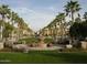 Landscaped town square with benches and a central fountain at 20254 W Roma Ave, Litchfield Park, AZ 85340