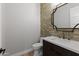 Stylish powder room with modern vanity and elegant tile at 15436 E Dixileta Dr, Scottsdale, AZ 85262